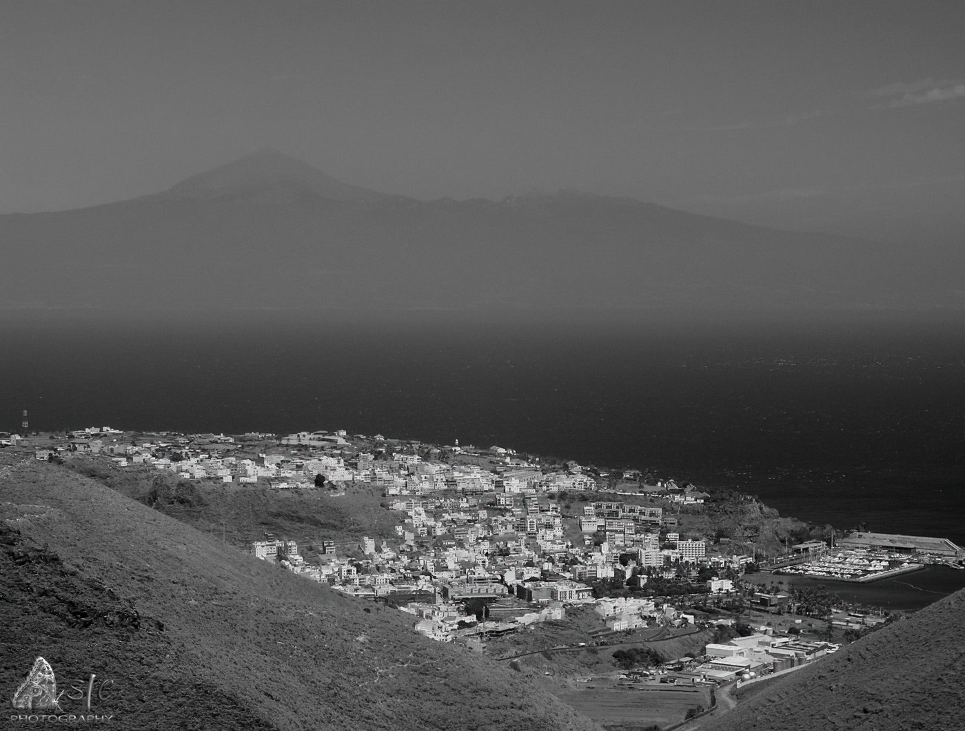 San Sebastian de La Gomera – La Gomera Island – Canary Islands (Spain) and in the background Tenerife Island, with the mighty peak of Teide volcano